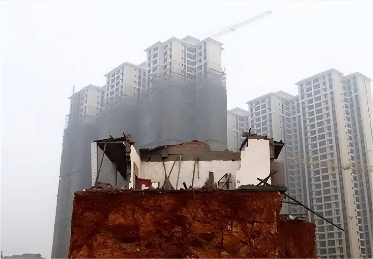 长沙最牛钉子户拆除纪：七兄妹装18个摄像头，养3条狼狗一条藏獒 (图4)